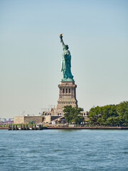 Fototapeta premium The Statue of Liberty Enlightening the World. Usa National Monument. Recognized as a universal symbol of freedom and democracy. National Park Service.
