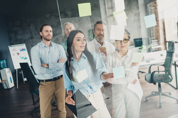 Photo of teamwork startup partners brainstorming sticky notes glass door comfortable nice creative...