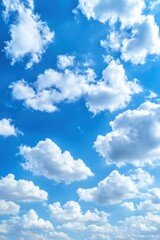 Obraz premium An abstract light blue sky with scattered clouds fills the background