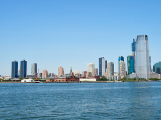View of New Jersey from New York. Jersey City. Waterfront. Liberty Towers. New Port buildings. Path Hoboken station. Statue Cruises Departure.