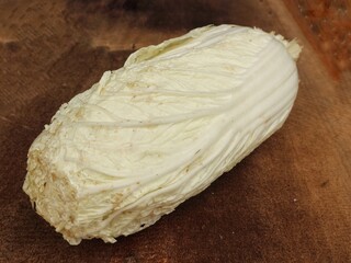 Close-up view of chicory greens on wooden surface
