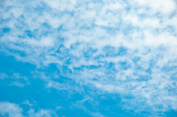 Obraz premium Cloudy skyscape background. Cloudscape sky background. Cloud in the sky. Background with cloud. Gloomy sky with overcast clouds. Skyscape and cloudscape. Sky with clouds. Weather