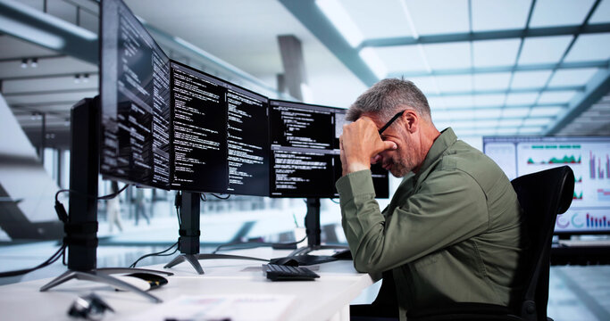 Unhappy Sad Developer Programmer Man In Stress Coding Software - Powered by Adobe