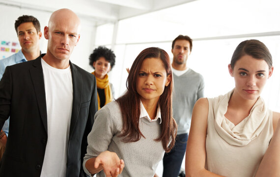 Meeting, portrait and group of frustrated business people with questions, solidarity and angry protest in office. Workshop, women and men with stress, doubt and confused team at seminar with feedback