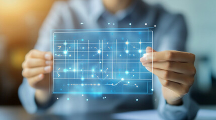 Business professional analyzing digital financial trends through a futuristic holographic display in a modern workspace during the day