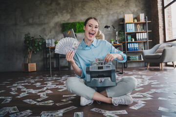 Photo of excited charming lady assistant wear shirt glasses counting dollars indoors workplace...