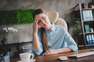 Photo of unhappy sad lady assistant wear shirt glasses feeling bad indoors workplace workstation