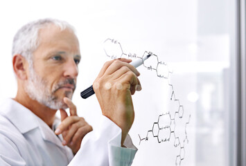Thinking, man and writing on glass for science, problem solving and brainstorming in lab. Mature...