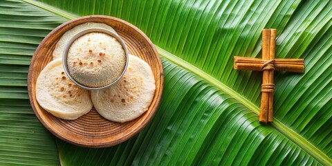 Pesaha appam bread and paal served on Maundy Thursday, with rice flour, Kerala, India, Palm Sunday, Easter Sunday, top view, coconut palm leaf cross background