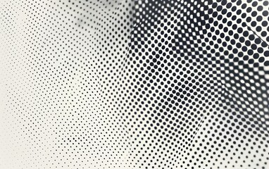 Abstract black and white dotted pattern with gradient effect. Digital texture for design and print.