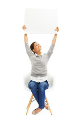 Studio, chair and woman with blank poster for deal, promo or happy news announcement on mockup sign. Signage, card and girl with billboard for sale, discount or product info on white background space