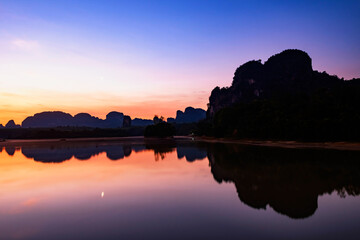 Nong Thale lake and limestone mountain at dawn, Krabi, Thailand