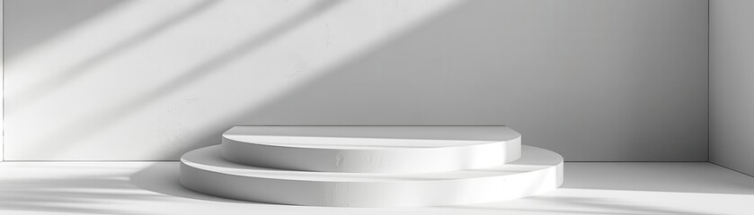 White platform with soft light and shadows.