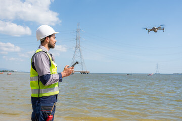 Engineer Specialists Pilot Drone on Construction Site. Architectural Engineer and Safety Engineering Inspector Fly Drone at industrial plant.