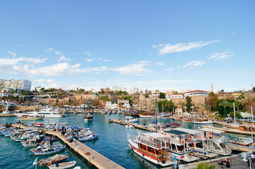 Landscape with sea marina and buildings on cliff. Antalya Turkey.