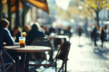 Blurred background of People sitting at tables in outdoor cafe, on bustling street. Relaxed atmosphere, featuring individuals enjoying coffee and casual conversation in lively city environment.
