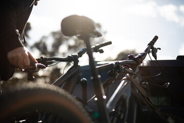 Mtb bike secured rear car ute tie rope travel explore cycle