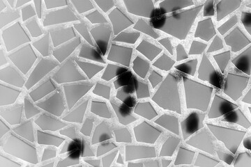 mosaic tile background in black and white film negative