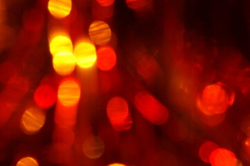Christmas blurred background. A luminous Christmas tree garland. Christmas decorations.