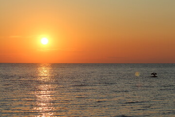 Landscape with sunset at the sea