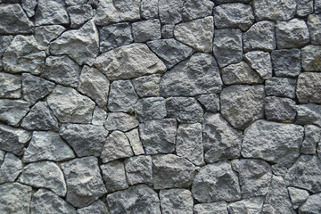 Texture of a stone wall. Old castle stone wall texture background. Stone wall as a background or texture