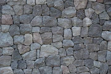Texture of a stone wall. Old castle stone wall texture background. Stone wall as a background or texture