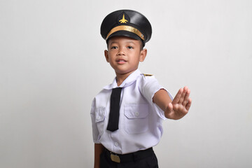 Little Asian boy Airplane pilot isolated on white background making stop gesture. Little boy dreams of becoming an airplane pilot.