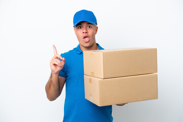 Delivery caucasian man isolated on white background intending to realizes the solution while lifting a finger up