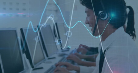 Naklejka premium Image of financial data processing over asian businessman using phone headset and computer