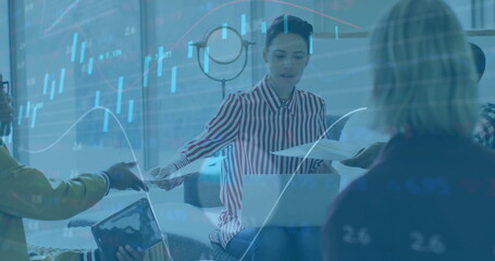 Image of financial data processing over diverse business people in office