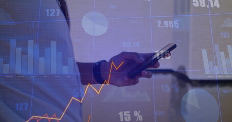 Image of data processing and diagrams over biracial man using smartphone