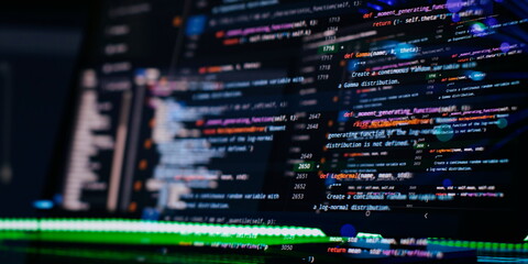 Coding script text on screen. Notebook closeup photo. Running Computer data programming.