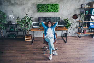 Full body photo of attractive woman sit armchair finish work wear blue shirt modern office...
