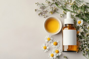A serene arrangement featuring a dropper bottle, herbal oil, and chamomile flowers.
