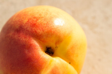 Juicy ripe yellow and red nectarines on a stone surface. Harvesting. Cooking. Delicious and healthy natural food.