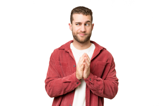 Young handsome blonde man over isolated chroma key background scheming something