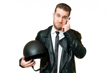 Business man with a motorcycle helmet over isolated chroma key background thinking an idea