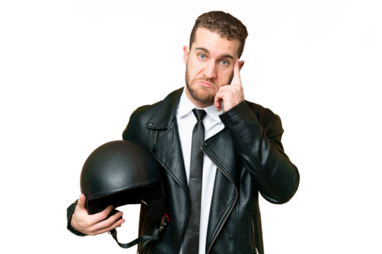 Business man with a motorcycle helmet over isolated chroma key background thinking an idea