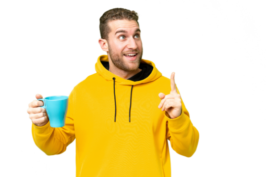 Young handsome blonde man holding cup of coffee over isolated background intending to realizes the solution while lifting a finger up