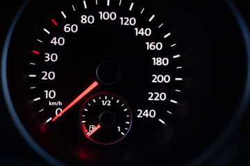 speedometer on black background