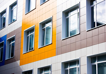Windows in the building. School facility, public building with double-glazed windows. Glass windows.