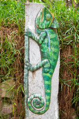 A beautiful green lizard statue. Picture clicked at Muttu Kadu Crocodile Park, Tamil Nadu, South...
