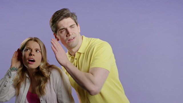 Young couple overhears something. Gossiper Pretty Woman and Man on Violet Studio