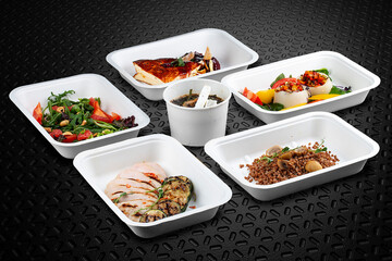 Fresh and flavorful dishes packed in eco-friendly containers for a healthy and convenient meal on the go.