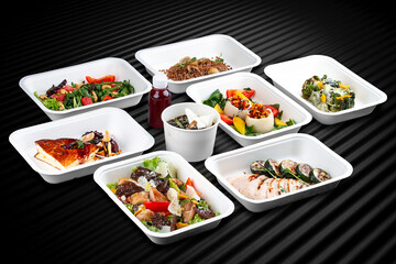 Fresh and flavorful dishes packed in eco-friendly containers for a healthy and convenient meal on the go.