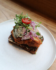 smorrebrod is the stuffed sandwich from Scandinavian countries and Denmark filled with vegetables and fried fish