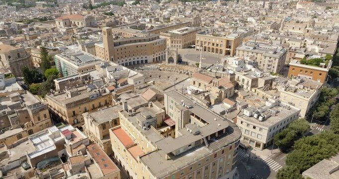 Aerial view of Sant'Oronzo square, Palazzo del Seggio and the Roman amphitheater of Lecce, In Puglia, Italy. It is for the people of Lecce the main meeting place.