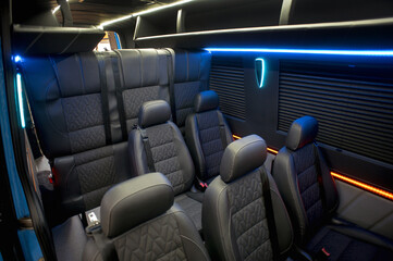 Comfortable interior of a passenger bus with soft seats. The design is made to order. Private covering of cars. Various elements of the bus interior. © Kaminski Vadim