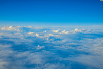 China Shanghai - Sunrise above the clouds from the plane