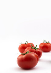 Tomatoes on white background. Isolated tomatoes on white background.
